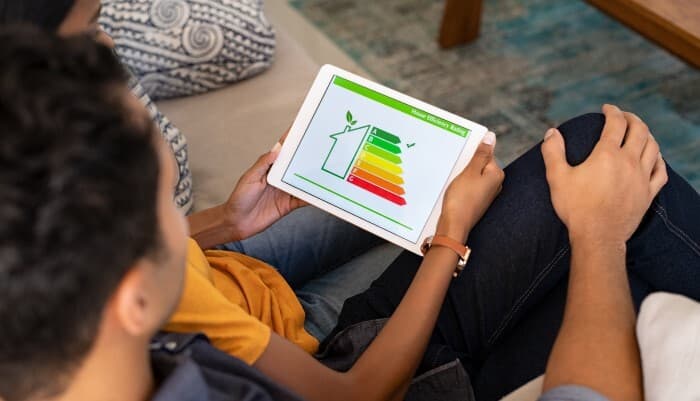 Couple watching house energy efficiency